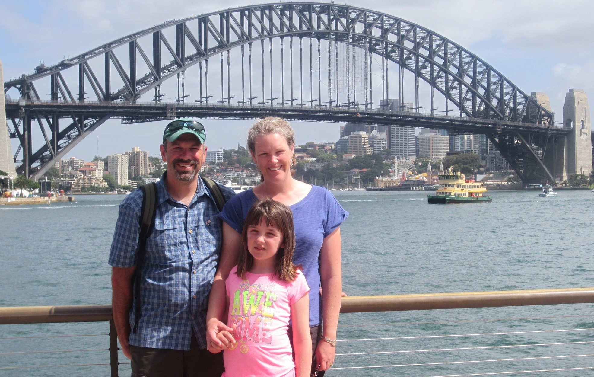 Photo of Fulbright Alumna Michelle Meade and her family in front of the Sydney Harbour Bridge