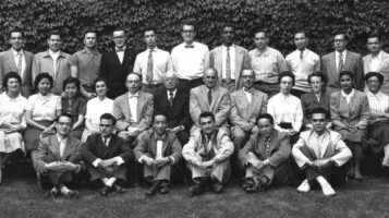 Sr Sally Isaac, 2nd row, 4th from left, with Eastman Dental Dispensary dental interns and staff. 1955-1956
